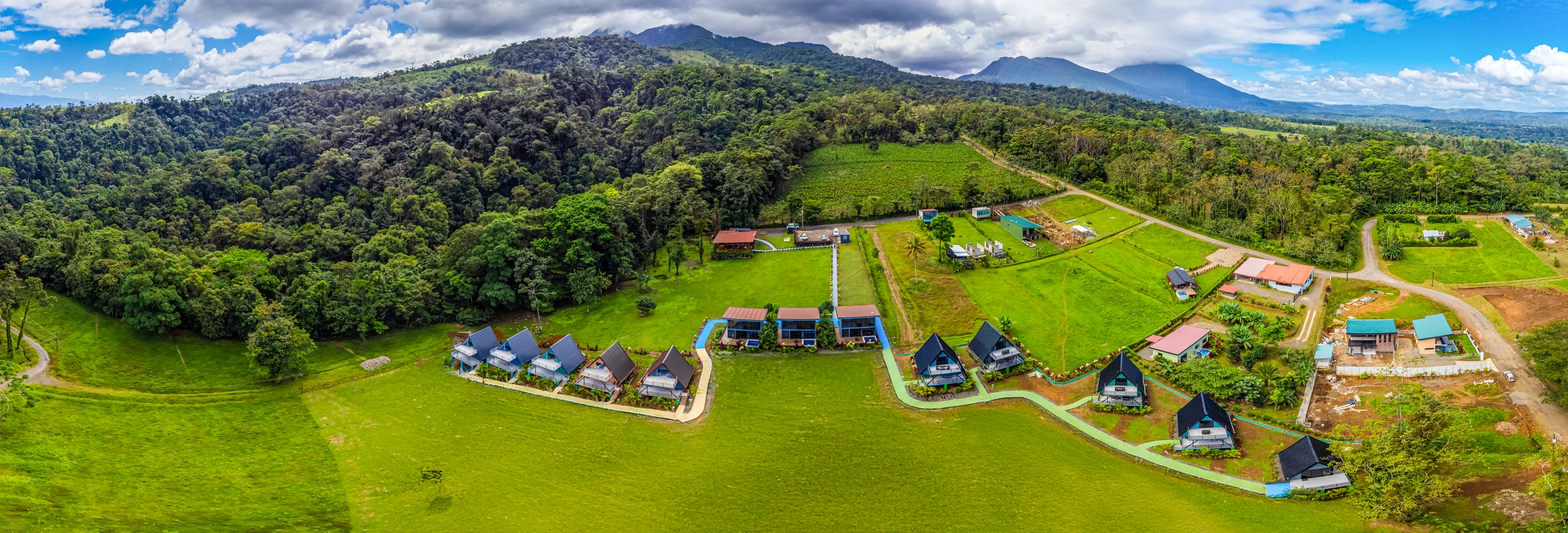 A wide panorama of Junglo Resort surrounded by the Costa Rican rainforest